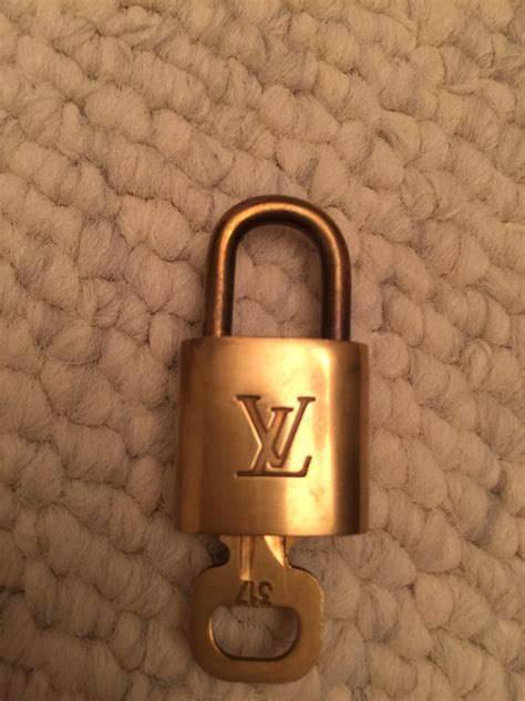 lv bag with padlock|lv lock and key.